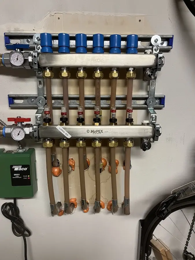 Plumber performing Leak Detection at a residential property in Manchester